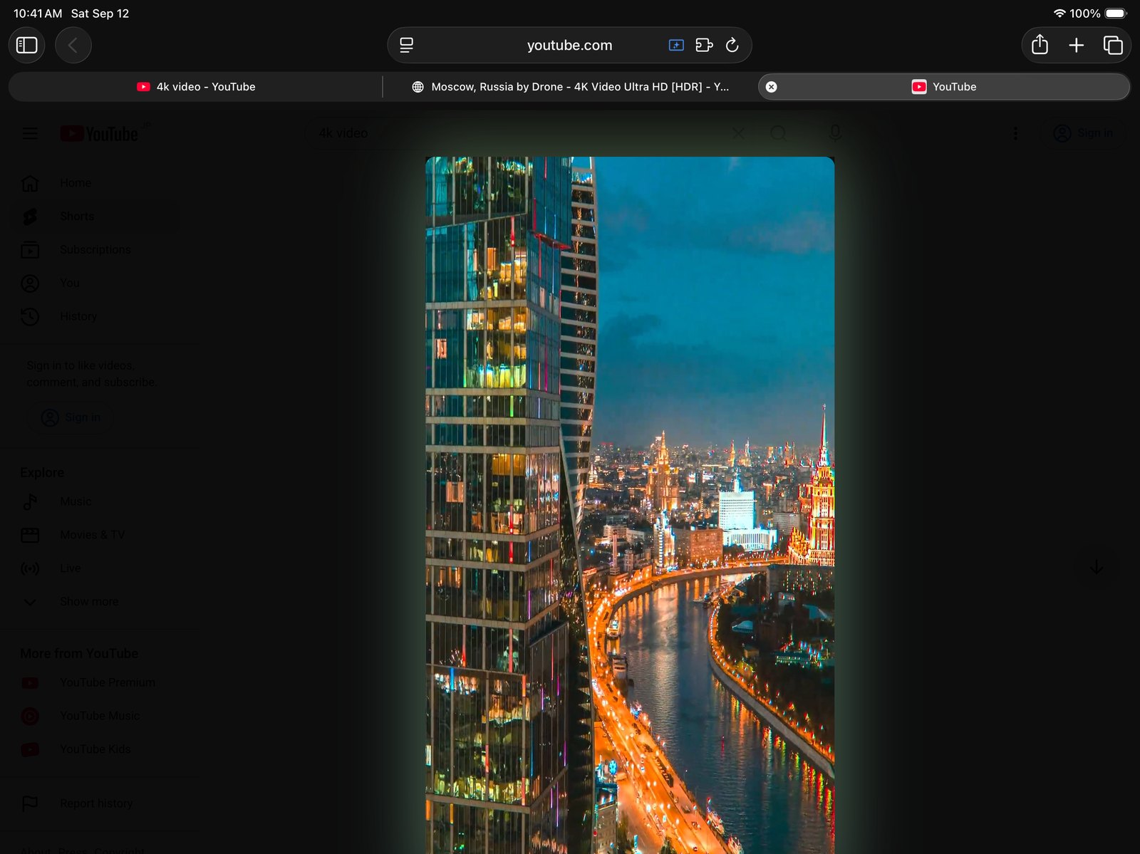 A vertical Short lit by its own colours with the action buttons hidden