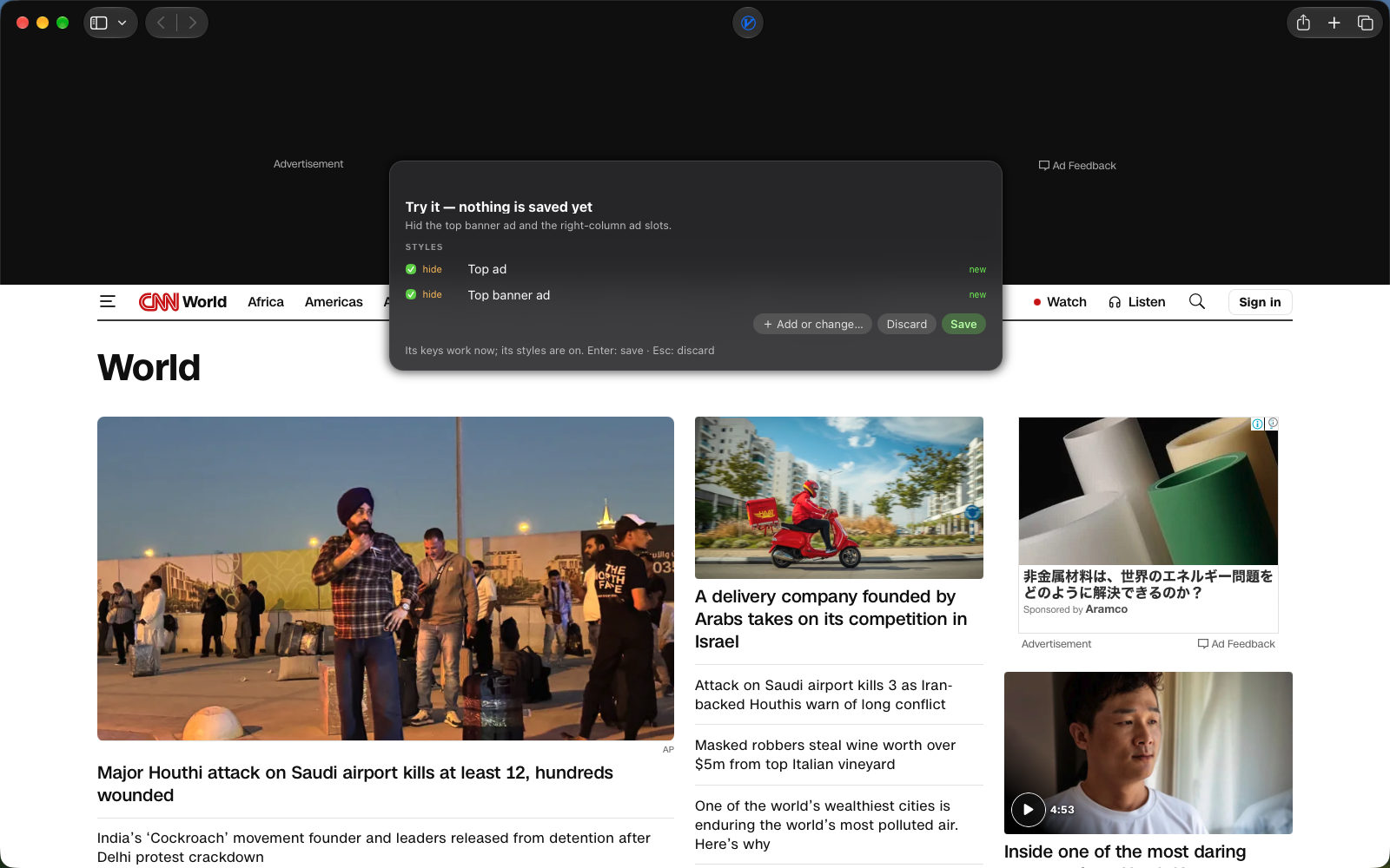 CNN with the top banner ad gone and the Try panel listing two hide styles for the ad slots
